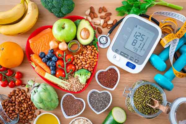 Image of healthy food and heart monitor