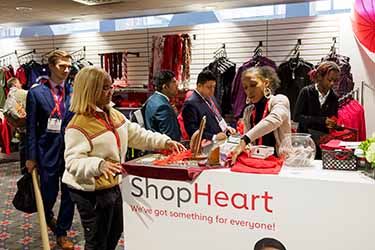 Attendees shopping at Shop Heart during Scientific Sessions 2023